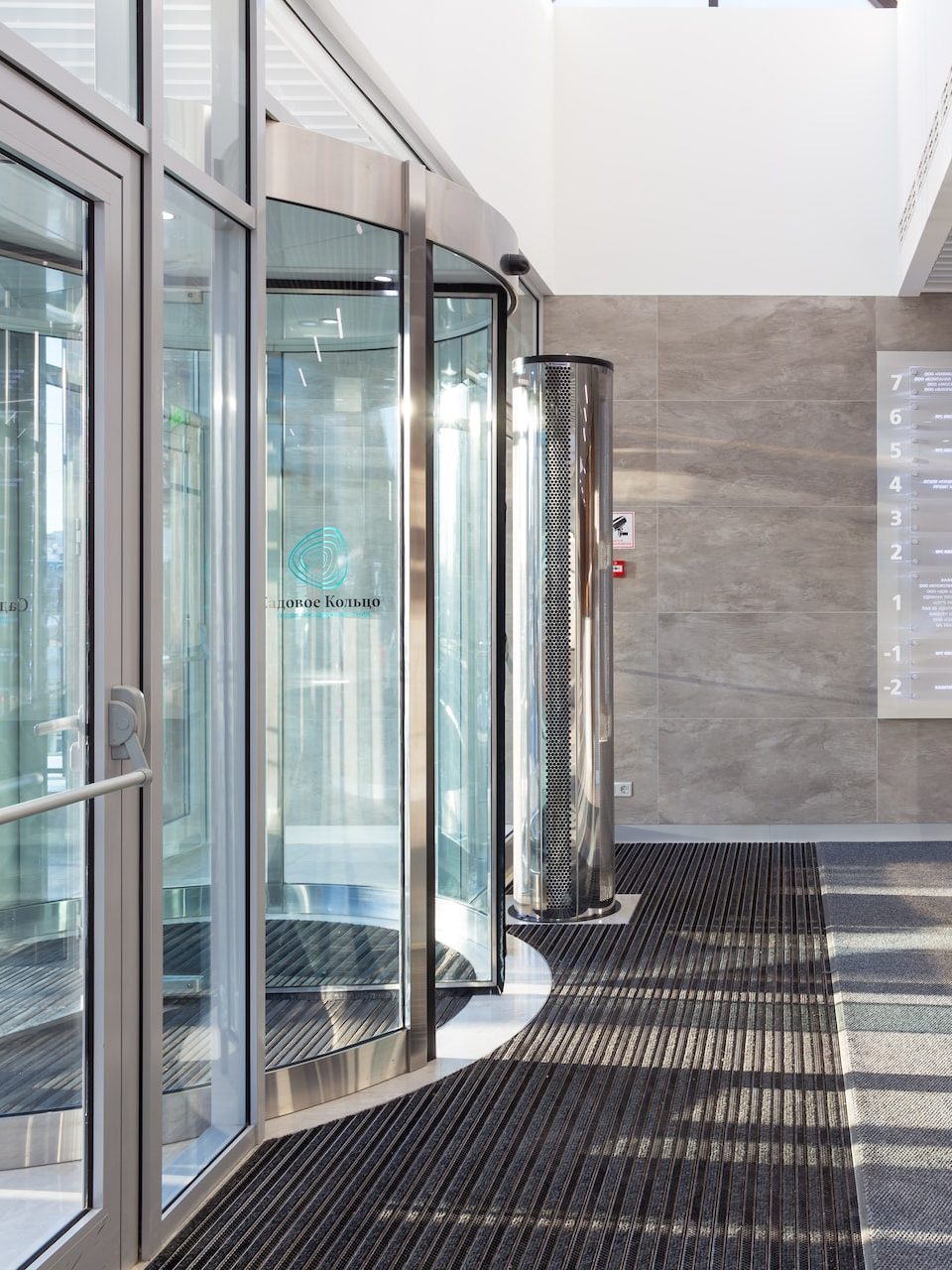 white and brown tiled hallway