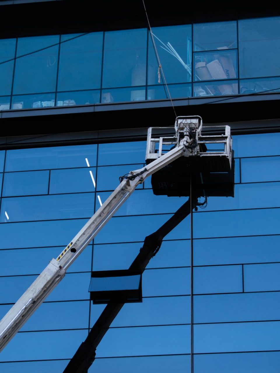 white and black security camera on black metal frame